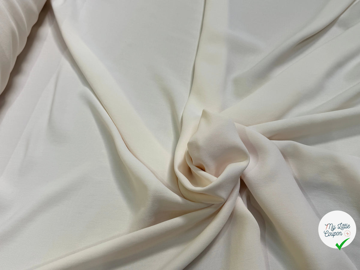 Tissu crêpe peau de pêche écru