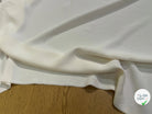 Tissu crêpe peau de pêche écru - texture en gros plan