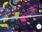 CREPE GEORGETTE SOIE FIORI PSICHEDELICI SU SFONDO NERO MLC INTERN