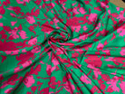 CRÊPE LÉGÈREMENT SATINÉ FLEURS ABSTRAITES FOND VERT - My Little Coupon