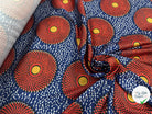 CRÊPE LÉGÈREMENT SATINÉ ROSACES ABYSALES ORANGE ET BLEU MLC INTERN