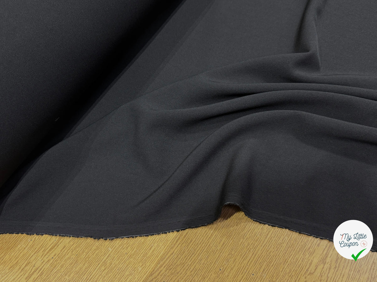 CRÊPE LOURD DE TAILLEUR AU TOMBÉ PLOMBANT NOIR 81% LAINE 16% SOIE - My Little Coupon