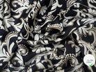 CRÊPE LEGEREMENT SATINÉ FLEURS BAROQUE SUR FOND NOIR - My Little Coupon