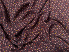 CRÊPE VISCOSE FOND VIOLET MOTIFS TRIANGLE MULTICOLORE - My Little Coupon