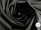 SATIN FAUX CUIR UNI NOIR STRETCH ENVERS TOUT DOUX - My Little Coupon