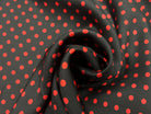 TWILL DE SOIE IMPRIMÉ FONDS NOIR POIS ROUGE MSO
