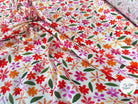 VISCOSE DOUCE TRES LEGEREMENT SATINEE PRINT FLEURS MULTICOLORES FOND BLANC - My Little Coupon