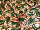 VISCOSE FLUIDE FOND BEIGE MOTIFS FEUILLAGES VERT ORANGE - My Little Coupon