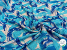 VISCOSE FLUIDE FOND BLANC IMPRIMÉE TOURBILLON ROI TURQUOISE - My Little Coupon