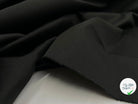 GABARDINE FINE DE COTON STRETCH NOIR ÉPOUSTOUFLANT - My Little Coupon - tissu - coudre
