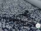 GABARDINE JAPON STRETCH FLEURS BLEU SUR NOIR VERSO BLEU GRIS MSO