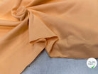 JERSEY COTON 2% ÉLASTHANNE TUBULAIRE 70CM CÔTE 1X1 BUFF ORANGE - My Little Coupon