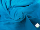JERSEY COTON 2% ÉLASTHANNE TUBULAIRE 70CM CÔTE 1X1 MYKONOS BLUE - My Little Coupon