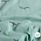 Jersey de coton baleines bleu bébé