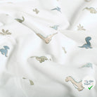 Jersey de coton dinosaures blanc cassé