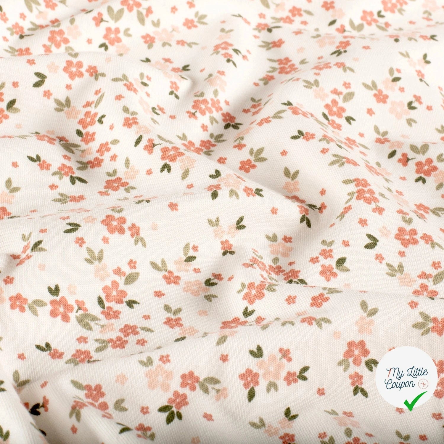 Jersey de coton fleurs blanc cassé