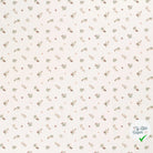Jersey de coton fleurs blanc cassé