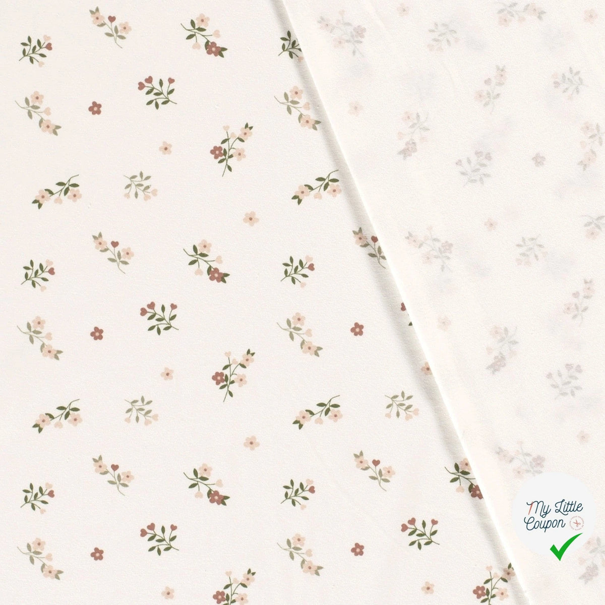 Jersey de coton fleurs blanc cassé