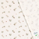 Jersey de coton fleurs blanc cassé