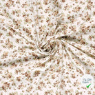 Jersey de coton fleurs blanc cassé