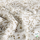 Jersey de coton imprimé fleurs blanc cassé