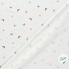 Jersey de coton papillons blanc cassé