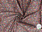 JERSEY STRETCH PETITES FLEURS MIGNONETTES FOND NOIR - My Little Coupon - tissu - coudre