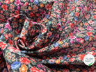 JERSEY STRETCH PETITES FLEURS MIGNONETTES FOND NOIR - My Little Coupon - tissu - coudre