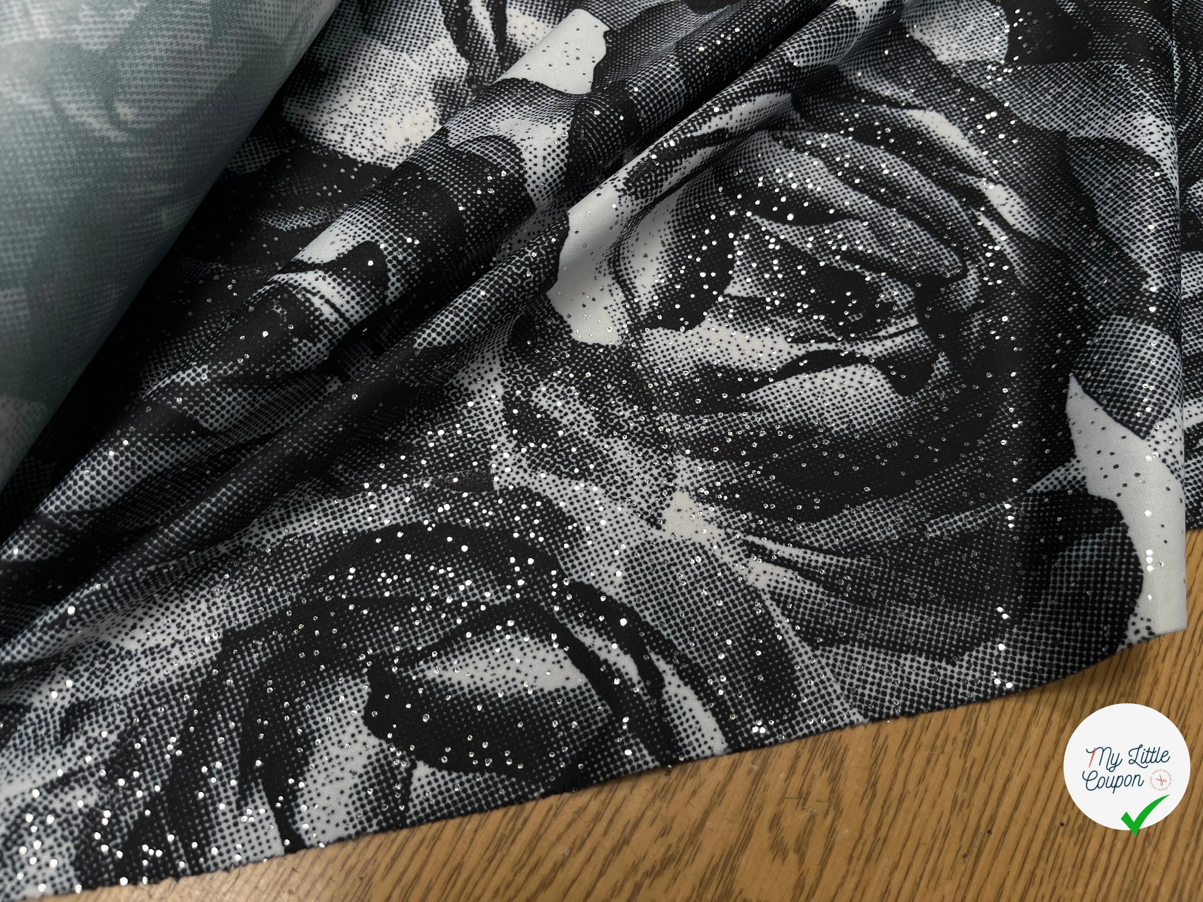 JESRSEY FLUIDE IMPRIMÉ GROSSES FLEURS BLANC&NOIR AVEC BRILLANTINE ARGENTÉ - My Little Coupon