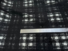 LAINAGE MANTEAU BOUCLETTE À CARREAUX BLANC ET NOIR - My Little Coupon