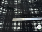LAINAGE MANTEAU BOUCLETTE À CARREAUX BLANC ET NOIR - My Little Coupon
