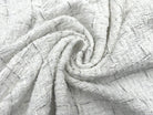 LAINAGE TWEED DE PRINTEMPS BLANC ET LISERÉS NOIRS MSO