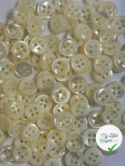 LOT DE 10 BOUTONS SOUPLES A 4 TROUS BLANC NACRE 9MM - My Little Coupon