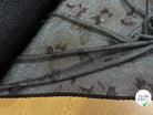 Tissu maille de fête argentée florale noir - détail du tissu