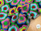 MAILLE VISCOSE STRETCH IMPRIMÉ FLEURS PSYCHÉDÉLIQUES MISTERY FLOWER POWER - My Little Coupon