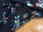 MAILLE VISCOSE STRETCH IMPRIMÉ GRANDES FLEURS BLEU CIEL FOND MARINE - My Little Coupon