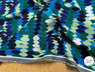MAILLE VISCOSE STRETCH IMPRIMÉ OLIVES BLEU MISTERY EN RANG BLEU - My Little Coupon