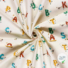 POPELINE DE COTON IMPRIMÉ LETTRES BLANC CASSÉ - My Little Coupon