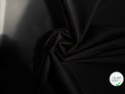 POPELINE DE COTON UNIE NOIR AVEC ELASTHANNE EFFET SATINÉ - My Little Coupon