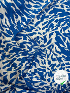 POPELINE DE VISCOSE TISSU IMPRIMÉ CAMOUFLAGE BLEU - My Little Coupon