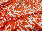 POPELINE DE VISCOSE TISSU IMPRIMÉ CAMOUFLAGE ORANGE - My Little Coupon