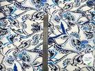 SATIN DE COTON STRETCH FLEUR D'ORIENT BLEU FOND BLANC MSO