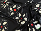 SATIN DE POLYESTER IMPRIMÉ MARGUERITES FOND NOIR - My Little Coupon