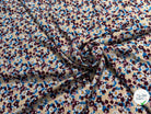 TISSU 100% VISCOSE FOND CAFÉ AU LAIT IMPRIMÉ BASE DE FLEURS - My Little Coupon