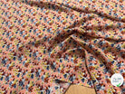 TISSU 100% VISCOSE FOND ORANGE PÊCHE IMPRIMÉ BOUQUETS - My Little Coupon