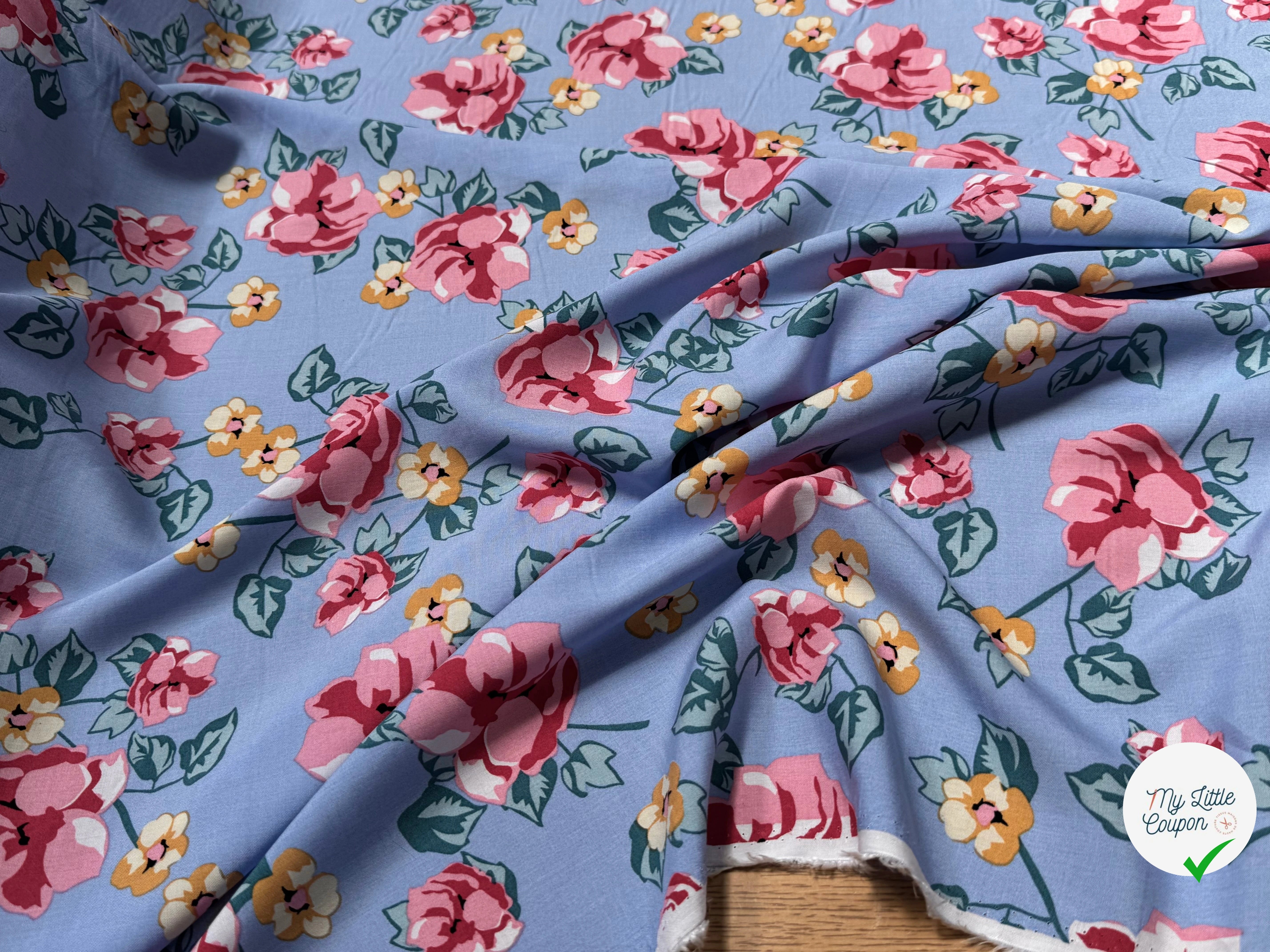 TISSU 100% VISCOSE IMPRIMÉ BRANCHES À FLEURS FOND BLEU CIEL - My Little Coupon