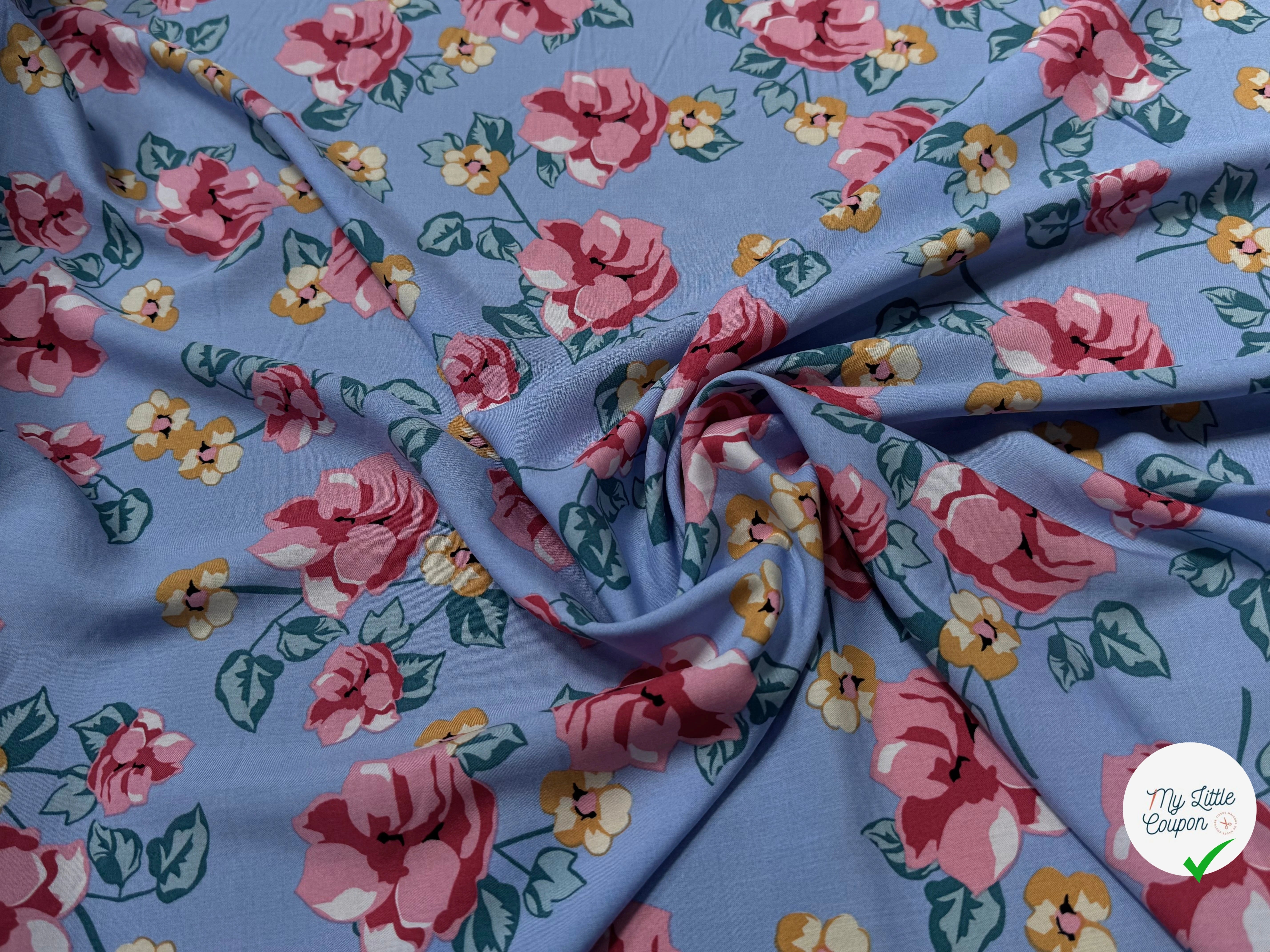 TISSU 100% VISCOSE IMPRIMÉ BRANCHES À FLEURS FOND BLEU CIEL - My Little Coupon