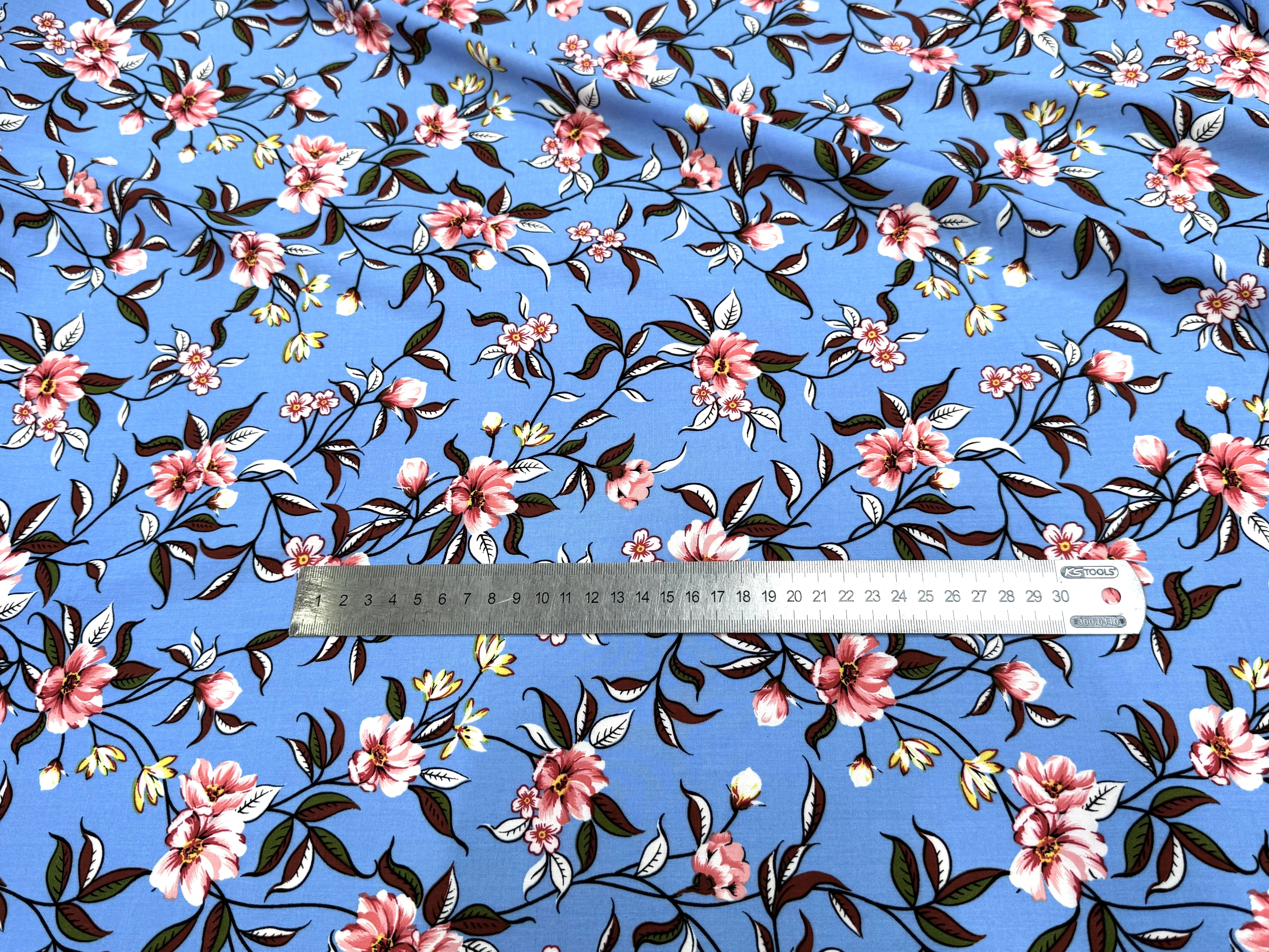 TISSU 100% VISCOSE IMPRIMÉ FOND BLEU CIEL - My Little Coupon