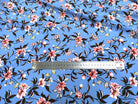 TISSU 100% VISCOSE IMPRIMÉ FOND BLEU CIEL - My Little Coupon