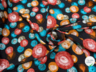 TISSU 100% VISCOSE IMPRIMÉ FOND NOIR MOTIFS CIRCULAIRES - My Little Coupon